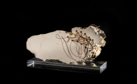 Held joined by a thread, Botticino marble and brass wire h 30x13x7, 2016